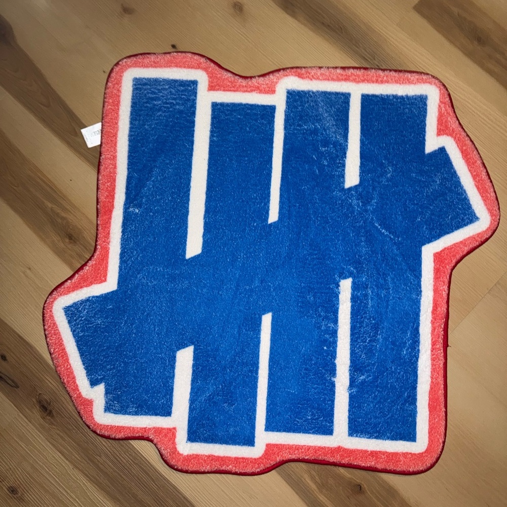Blue & Red Undefeated Logo Rug